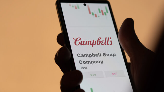 October 23th 2023 Camden, New Jersey. The logo of Campbell Soup Company on the screen of an exchange. Campbell Soup Company price stocks, $CPB on a device.