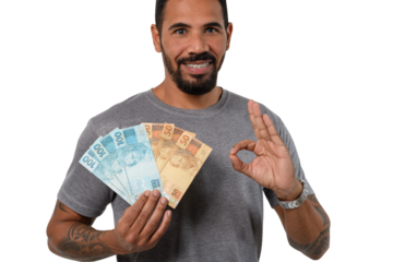Man with Brazilian money makes "okey" sign