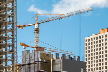 Crane, concrete blocks and scaffolding