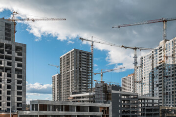 Fototapeta na wymiar Huge construction site with cranes.