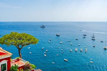 Boats and yachts on Tyrrhenian sea seen from Positano, Amalfi coast, Italy - obrazy, fototapety, plakaty