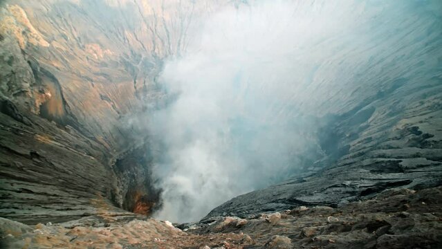 Video of the steaming active volcano crater of the Bromo on the Java island