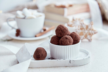 Aesthetics Christmas holidays with books, hot cocoa, ginger homemde cookies and truffle at cozy home. Aesthetic Christmas background