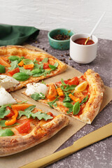 Tasty pizza with Burrata cheese on table