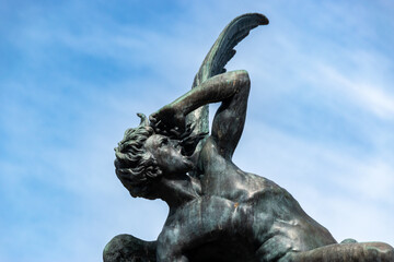 Fallen Angel statue of the Retiro Park, Madrid, Spain