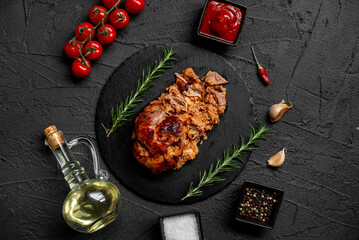 pork cooked in the oven on a stone background