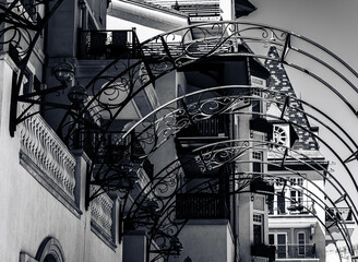 old street cobblestone in a old town in the mountains of Colorado with beautiful iron decor black and white photography