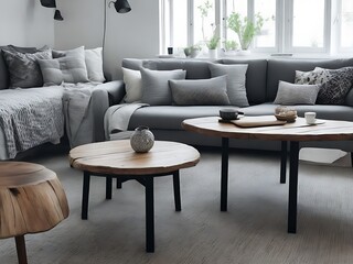 Sofa and lounge chair against grey wall with rustic shelves. Scandinavian home interior design of modern living room in attic.