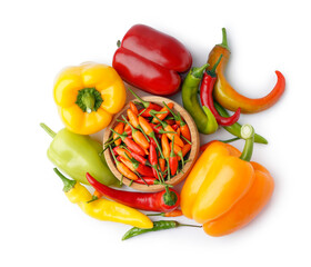 Chili and bell peppers with wooden bowl on white background.