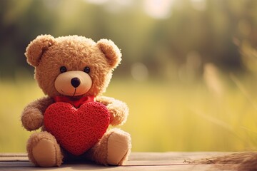 Teddy bear holding red heart feeling all lovey dovey