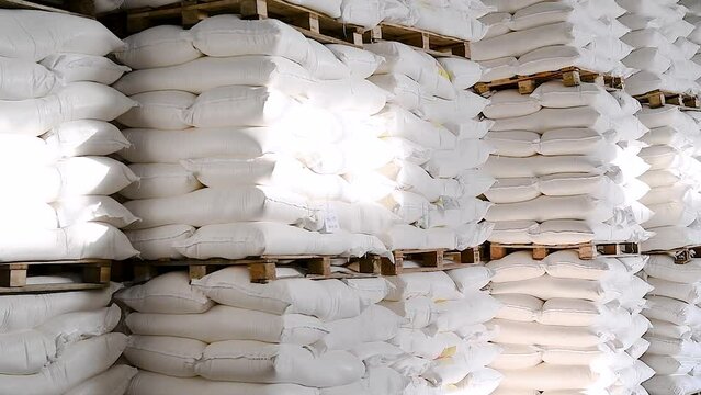 Food warehouse. Bags of rice, sugar, flour and other products.