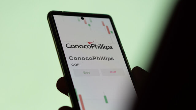 November 08th 2023 Houston, Texas. The logo of Conoco Phillips on the screen of an exchange. ConocoPhillips price stocks, $COP on a device.