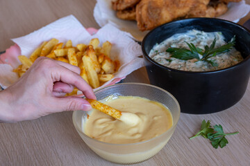 honey mustard, zinger, mayonnaise, onion rings, chicken fillet, strip, bread crumbs, home, deep fried, fried crispy, human hand, homos, humus, onion, wooden, green, garlic, hand, dip, french fries, re