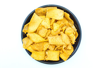 Soya chips in a plate on white background close-up view 