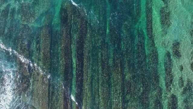 Colors and rock formations of El Sable beach. Coastal landscape in the town of Tagle. Aerial view from a drone. Suances Municipality. Cantabrian Sea. Cantabria. Spain. Europe