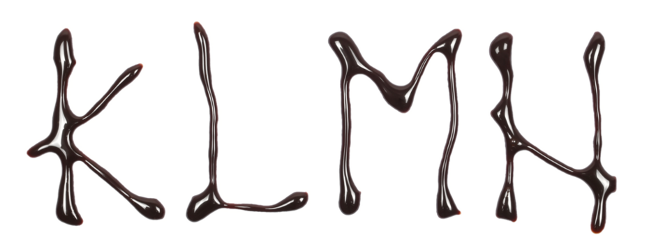 Chocolate topping spreading in shape letter k, l, m, n alphabet isolated on white, top view