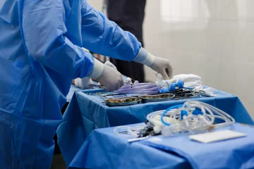 Foto op Plexiglas sterile instruments for surgery on the tray and hands © Ivan