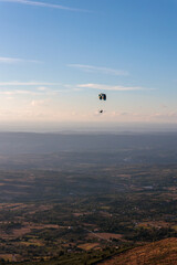 Fototapeta na wymiar Paraglider Soaring Over Serra da Estrela