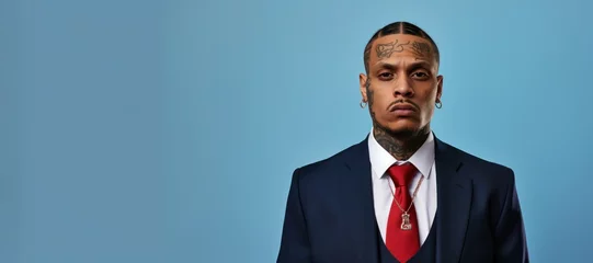 Foto op Aluminium Young black  businessman with face and neck tattoos serious face portrait © blvdone