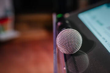 Close up a Microphone on the table, concept of speaker or teacher preparation to speak in seminar...