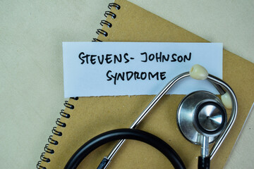 Concept of Stevens-Johnson Syndrome write on sticky notes isolated on Wooden Table.