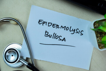 Concept of Epidermolysis Bullosa write on sticky notes with stethoscope isolated on Wooden Table.