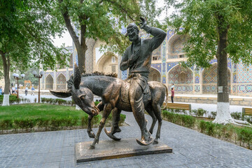 Uzbek tourists on Nasreddin Hodja monument, one of the most popular monument in the country.