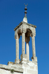 Obraz premium Cappadocia's Uchisar Town Spire With A Crescent Moon