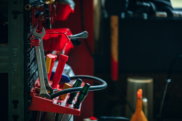 different tools on authentic workbench in workshop for car or bike repair
