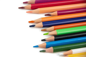 colored pencils on a white background close-up