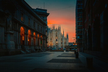 Milan Cathedral Square Milan Cathedral (Duomo di Milano) at sunrise from Merchants Square, no people - obrazy, fototapety, plakaty