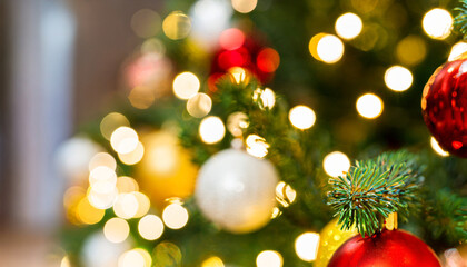 Obraz na płótnie Canvas christmas background christmas tree with golden bokeh lights
