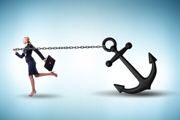 Businesswoman with anchor in business concept © Elnur