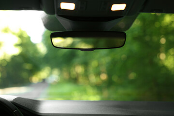 Clean rear view mirror in modern car