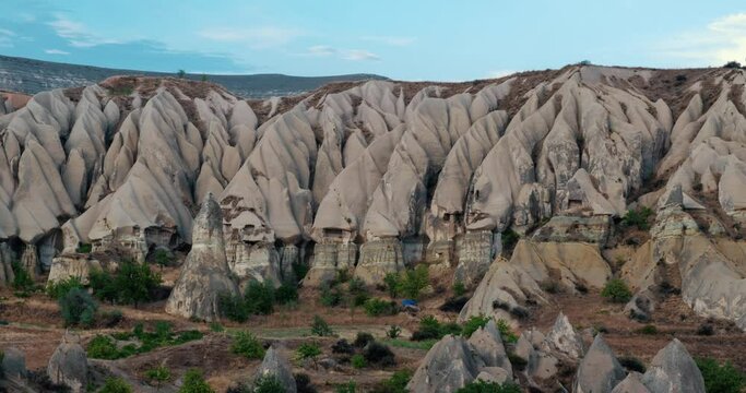 Somewhere in the Cappadocia region. It is the region that emerged as the soft layers formed by lava and ashes were eroded by rain and wind over millions of years.