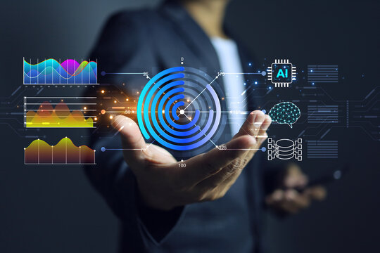 Data visualization concept. Programmer holding donut chart data in his hand to summarize large amount of data in easily to understand by using AI as assistant