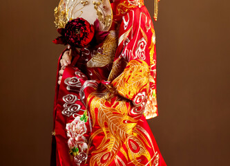 Fototapeta na wymiar Asian costume woman holding paper umbrella