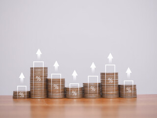 Stack of coins with arrow up icons and percentage. The concept of Financial investment, Market stock, Profit return, Dividend and Business fund.