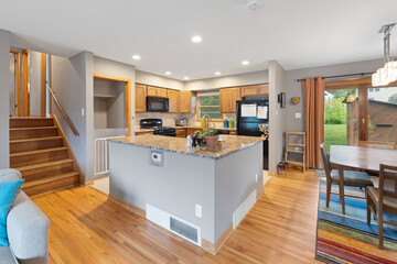 kitchen interior and wooden floor. Simply furniture with utensils, shelves with crockery and refrigerator in modern minimal design, empty space, wood floor
