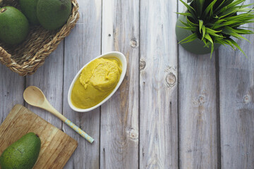 avocado and avocado pasted in a container