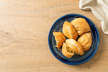 curry puff stuffed chicken on plate