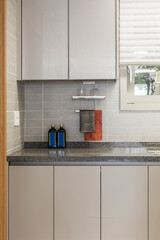 Close up of a kitchen area interior with a cabinet