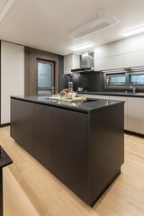 Kitchen island in modern kitchen interior.