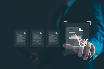 Electronic document management concept. Document management man sign an electronic approve, online document, paperless workplace, digital electronic approve business quality agreement. Virtual screen
