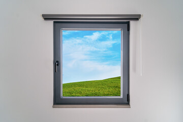 Window of house apartment in the country side. Field view. Living in nature