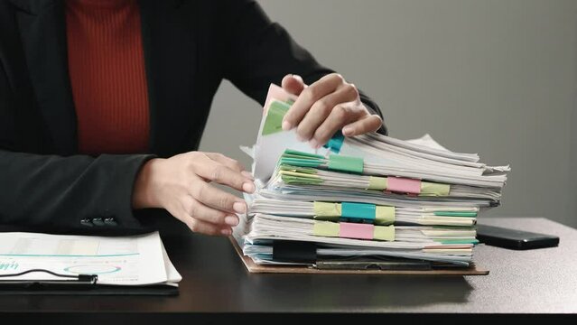 Businessmen deal with piles of documents, manage company financial documents, store important documents, design document management systems in organizations. Document management concepts, work files.