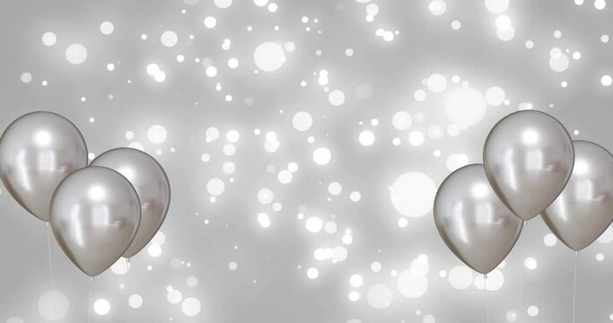 Animation of silver balloons over silver background