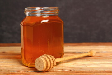 Jar of Honey with Honey Dipper