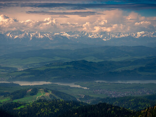 Obraz premium View of High Tatras and Lake Czorsztyn from Gorce Mountains
