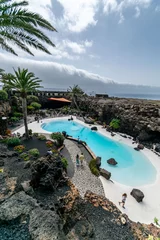 Foto op Canvas a view overlooking a man-made beach swimming pool on the volcanic island of Lanzarote.  © josehidalgo87
